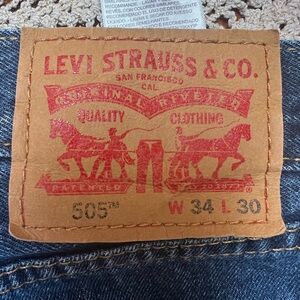 Levi's Men's 505 Straight Jeans in Denim Blue with Leather Patch